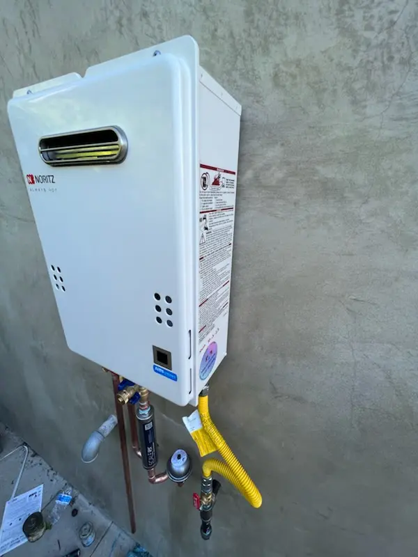 Tankless water heater installation for Tomlin homes